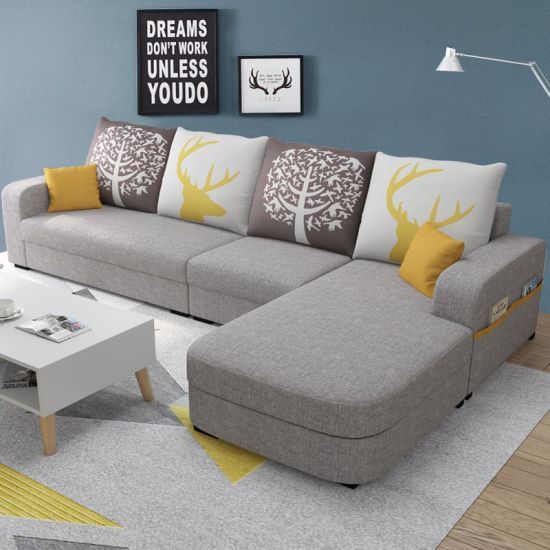 Grey color corner sofa and cushions